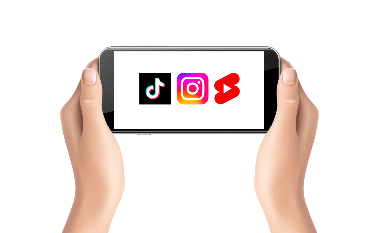 Hände halten ein Smartphone mit TikTok, Instagram und YouTube Shorts Logos auf dem Bildschirm